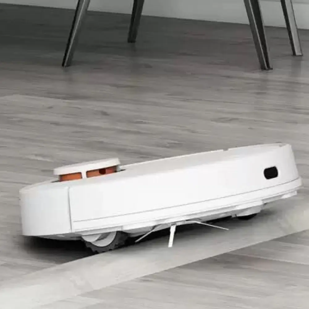 Přejíždění prahu Obrázek přejíždění prahu robotickým vysavačem