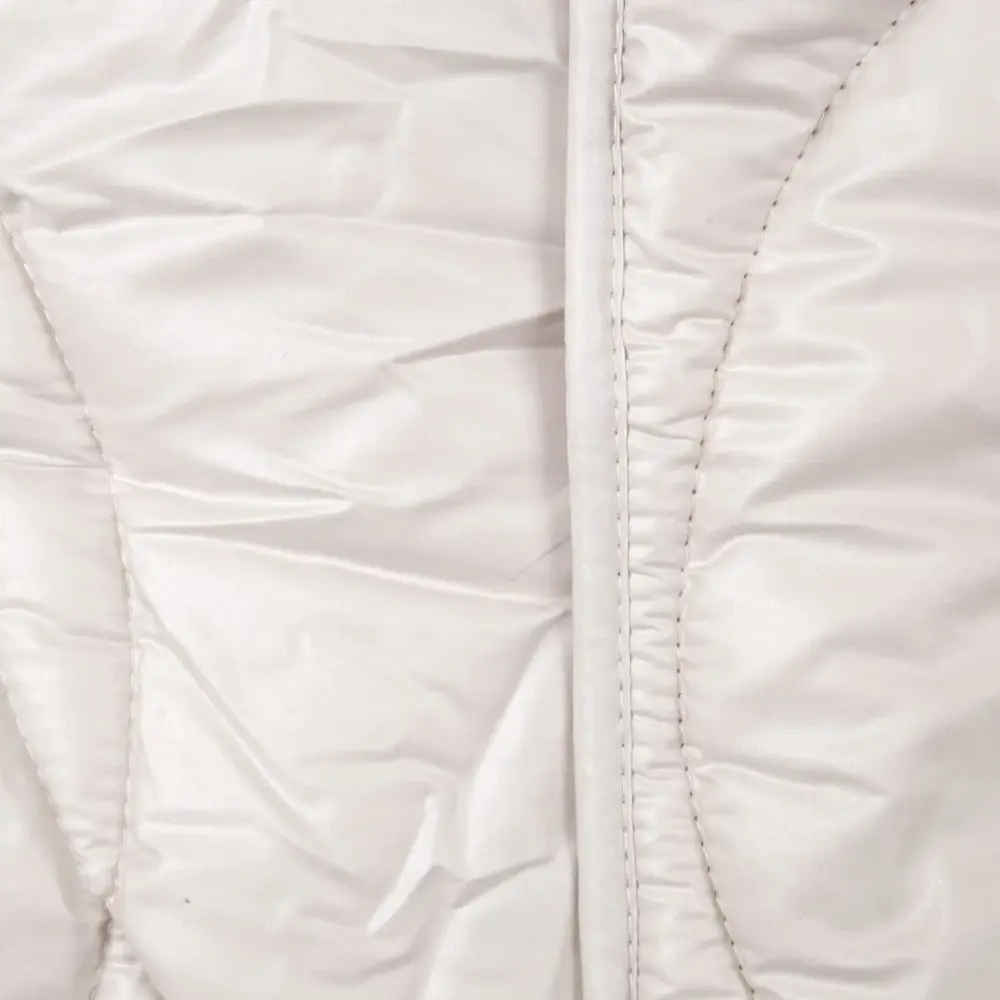 Detail na prošívání a vrchní bavlněný materiál Detail na prošívání a vrchní bavlněný materiál